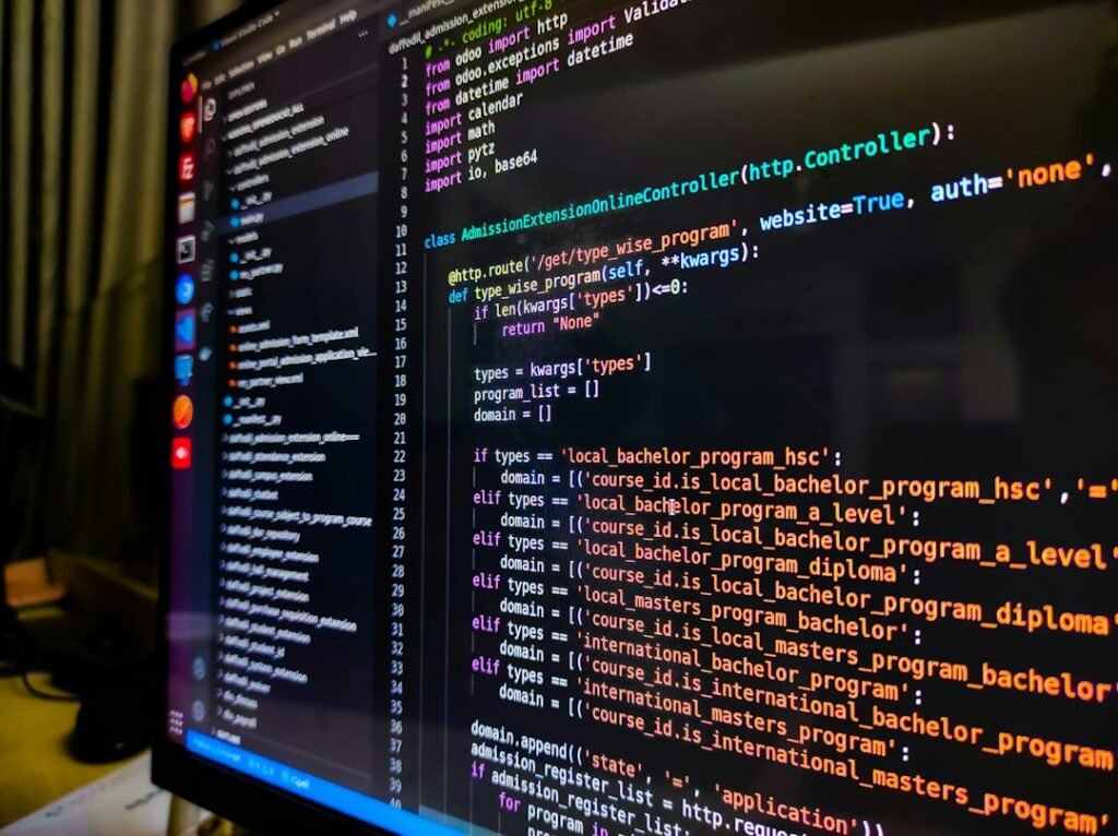 Colorful computer programming code on a screen illustrating AI-assisted game development